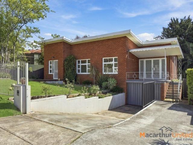 Charming Brick Home with Character, Comfort & Convenience
