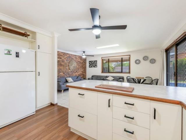 Charming Brick Home with a Pool: Perfectly Positioned for Family Living and Entertaining!
