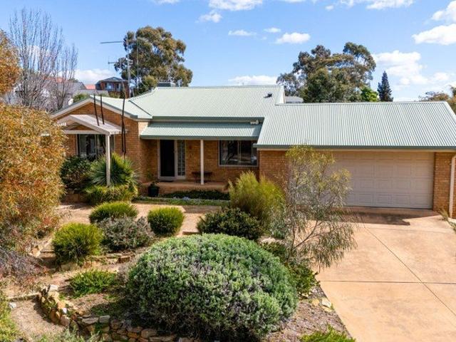 Charming Brick Home with Space, Style & Versatility