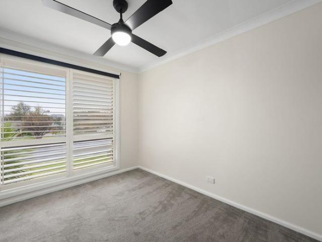 Charming Brick Home with Spacious Living & Double Garage