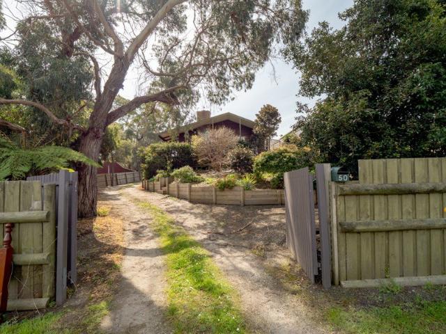 Charming Cedar Ranch Style Home