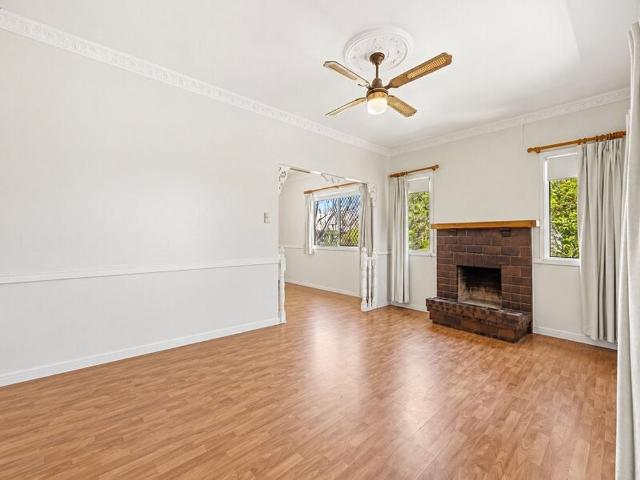 Charming Character Home with Spacious Living & Double Garage
