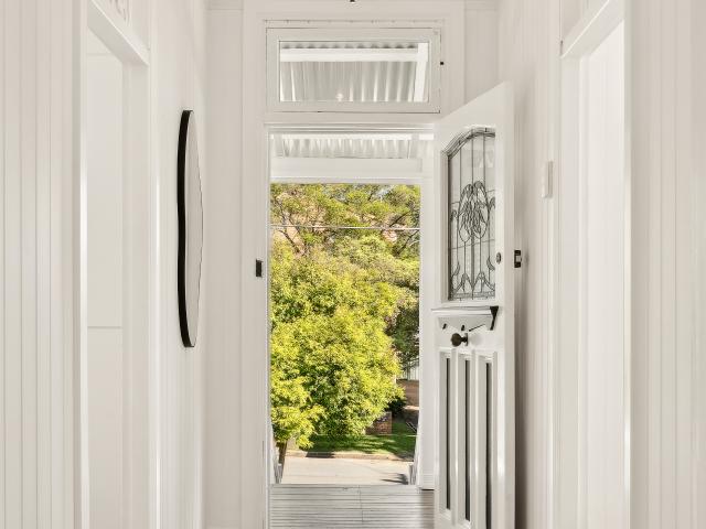 Charming colonial with designer upgrades and room to grow