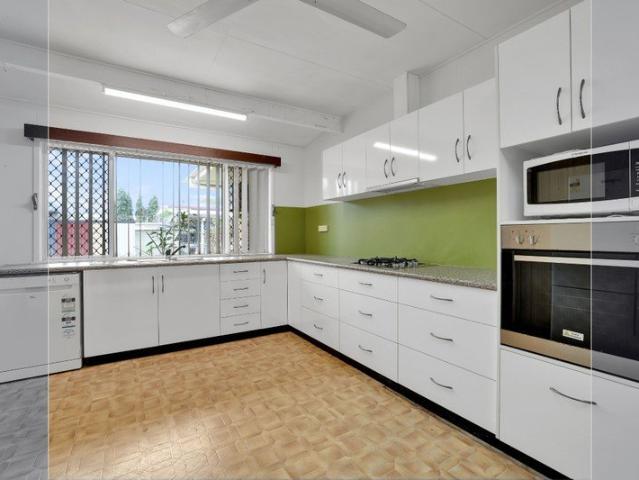 Charming Corner Block Home with Ample Potential