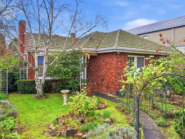 Charming Corner Opportunity in a Premier Surrey Hills Setting