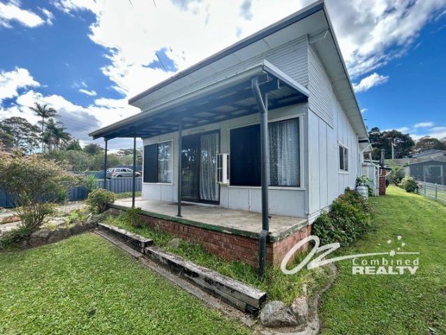 Charming Cottage Style Home in Prime Sanctuary Point Location