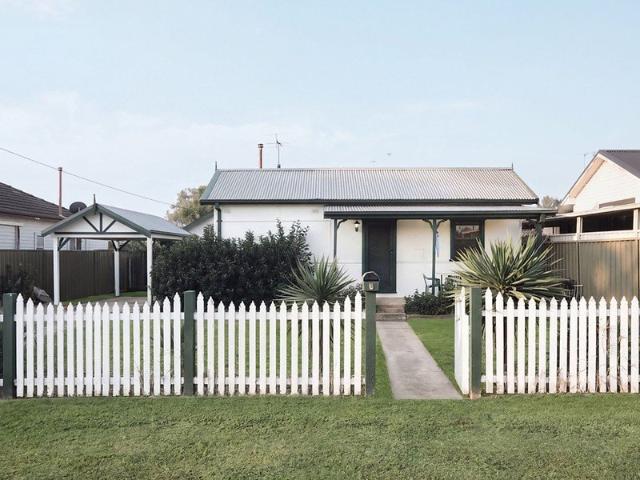Charming Cottage with Spacious Backyard!
