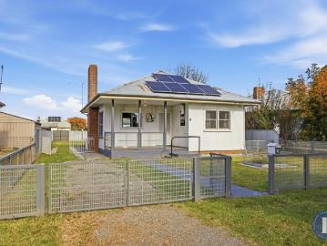 Delightful Two Bedroom Home with Rear Lane Access
