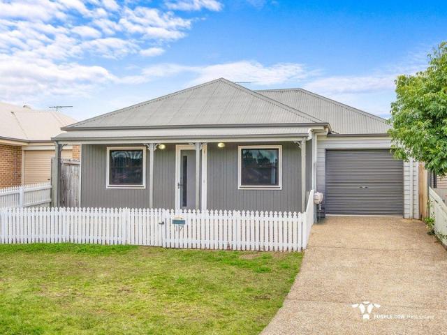 Charming Cottage with White Picket Fence