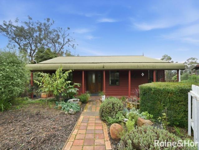 Charming Country Retreat on Approximately 1.25 Acres