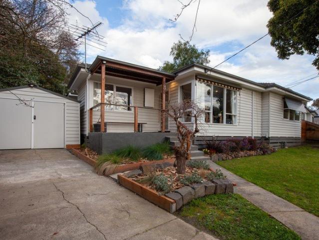 Charming Court Located Home with Space, Privacy & Potential