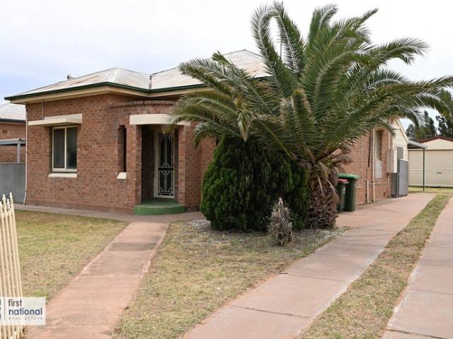 Charming Double Brick Home in a Convenient Central Location