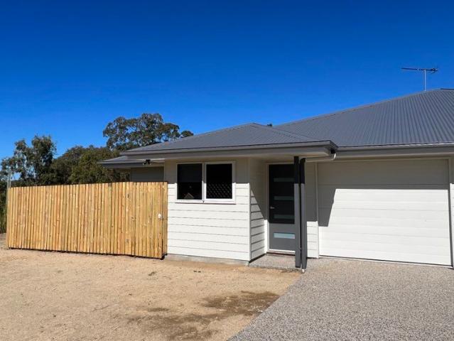 CHARMING DUPLEX IN CONVENIENT LOCATION
