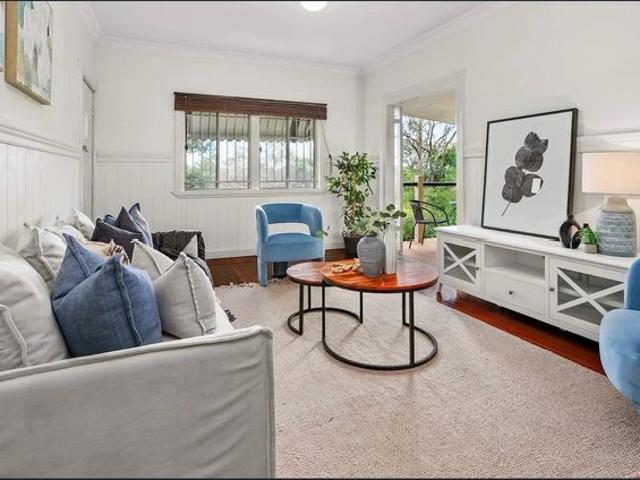 Charming Elevated Family Home with Huge Backyard in Prime Carina Heights Location