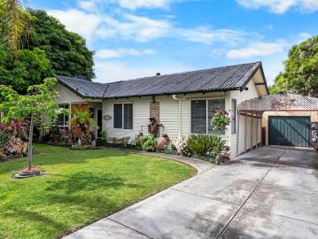 Charming Family Gem with Lush Gardens and Outdoor Living Appeal