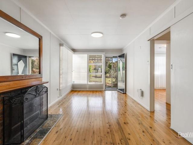 Charming Family Home with Multiple Living Areas & 7.5m x 6.0m Powered Shed & Side Access