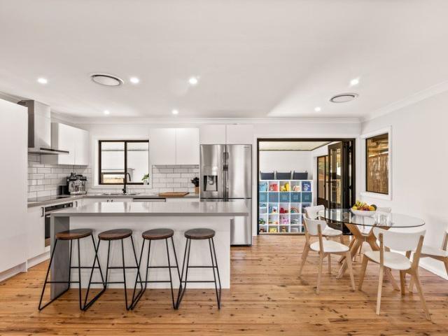Charming Family Home with Expansive Backyard & Endless Convenience