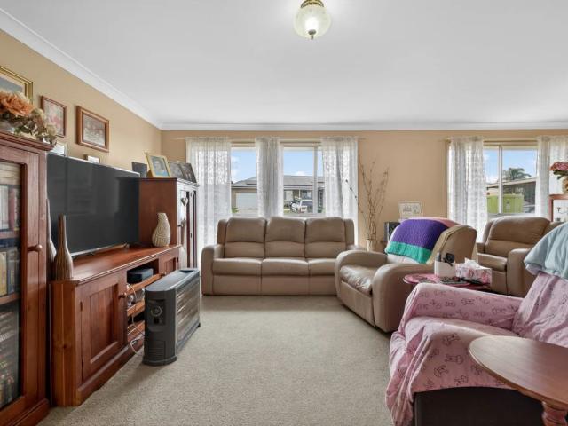 Charming Family Home with Spacious Backyard Appeal