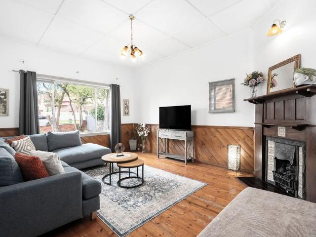 Charming Family Home with Spacious Backyard