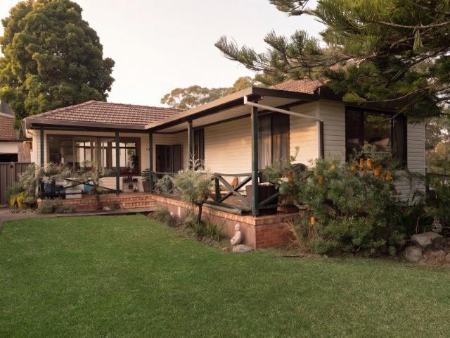 Charming Family Home in Tranquil Setting with Spacious Backyard and Ample Parking
