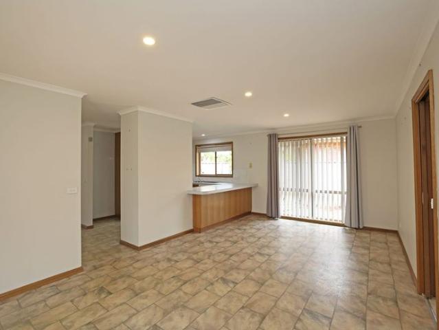 Charming Family Home in a Quiet Court Location with Massive Shedding!