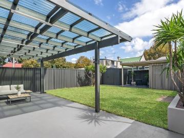 Charming Family Sanctuary with Elegant Entertaining in a Prized Cul de Sac