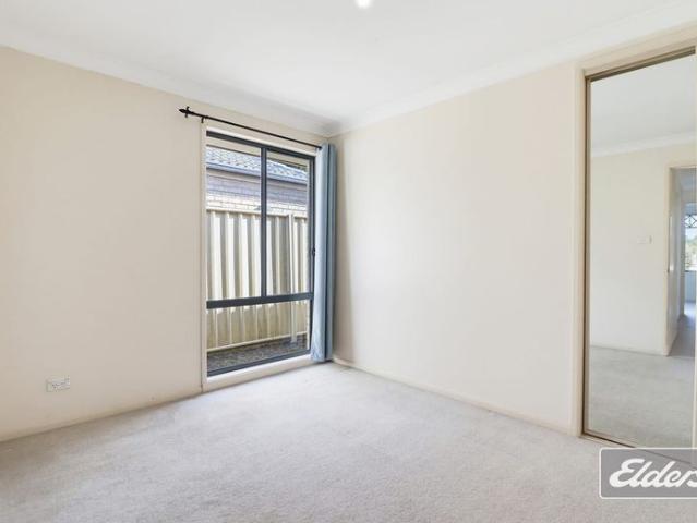 Charming Family Retreat in Prime Quakers Hill Location – Walk to Train Station!