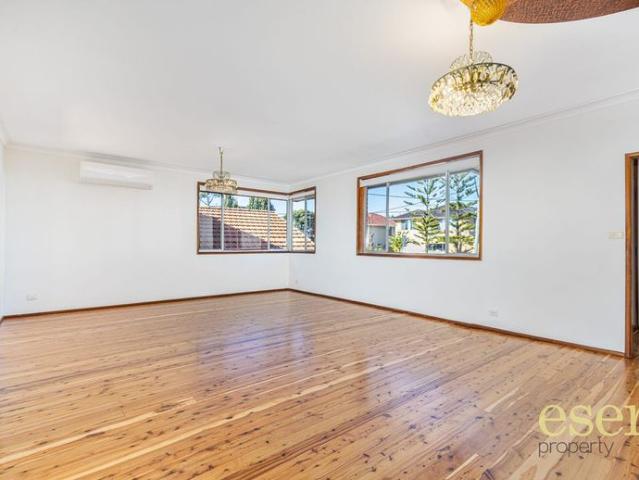 Charming Four Bedroom Home with Garage and Convenient Location