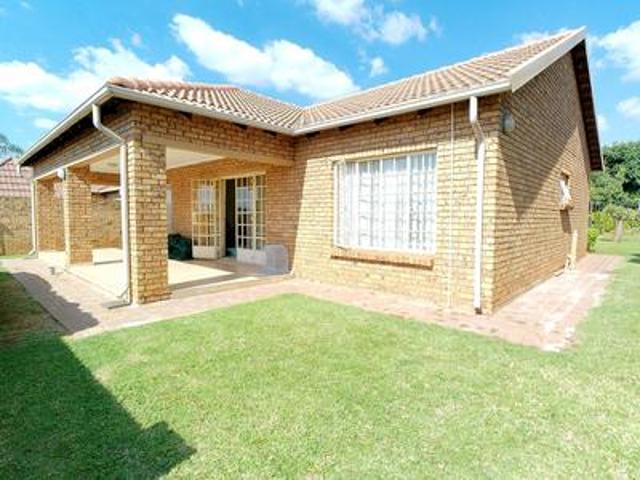 charming full title face brick home.
