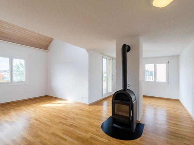 Charming ground floor apartment with cozy seating area and Swedish stove