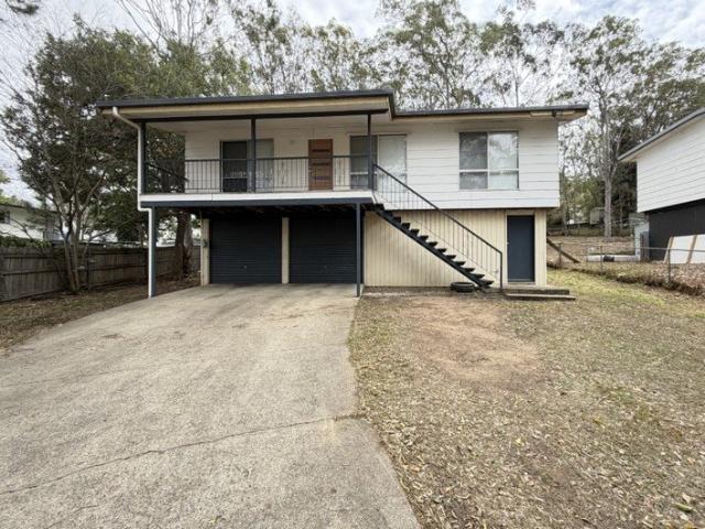 Charming High Set Home with Spacious Backyard!