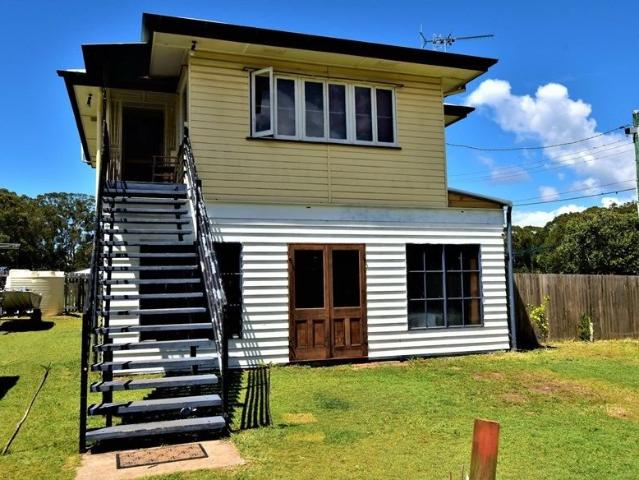 Charming High Set Queenslander Packed with Potential
