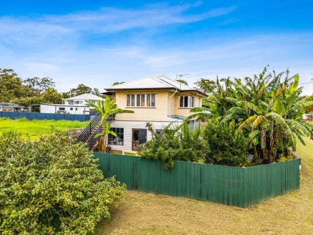 Charming High Set Queenslander Packed with Potential