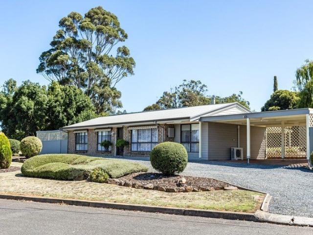 Charming Hillside Living with Space, Comfort & Convenience