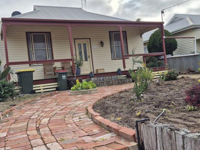 Charming Home on Generous Allotment with Endless Potential