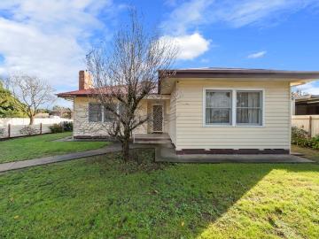 Charming Home on Generous Allotment with Endless Potential