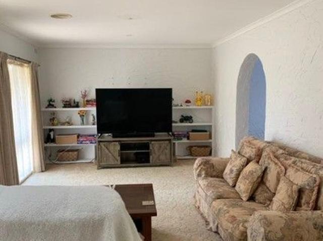 Charming Home with Beautiful Gardens & Excellent Storage