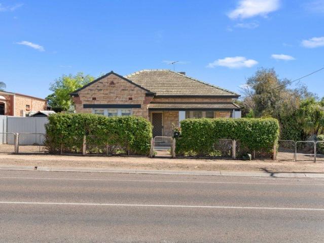 Charming Home with Extensive Shedding