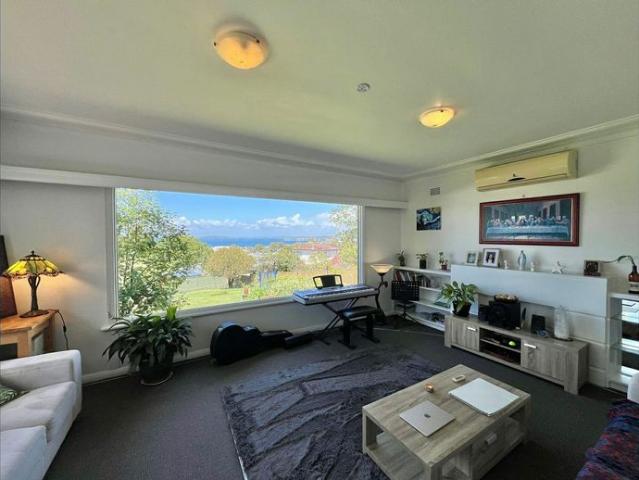 Charming Home with Stunning Lake Views & Spacious Gardens