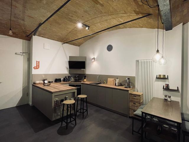 Charming loft in a historic 19th century malt house with south facing terrace and small garden in the heart of Florakiez