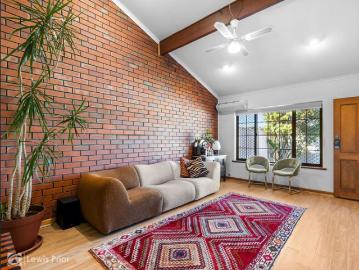 Charming & Low Maintenance Home with Private Yards in Prime Greenacres Location