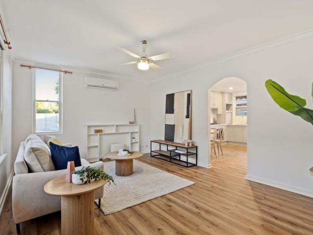 Charming Low Maintenance Living in Sought After Kensington Gardens