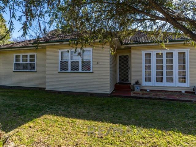 Charming Lowset Home in Convenient Newtown Location