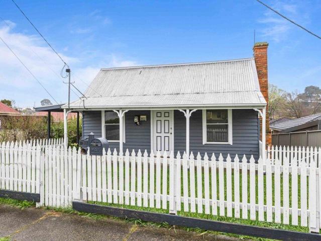 Charming Miners Cottage with a Warm and Inviting Feel