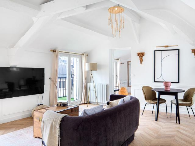 Charming Monnaie One Bedroom with Balcony Views, Paris Amsterdam Apartments for Rent