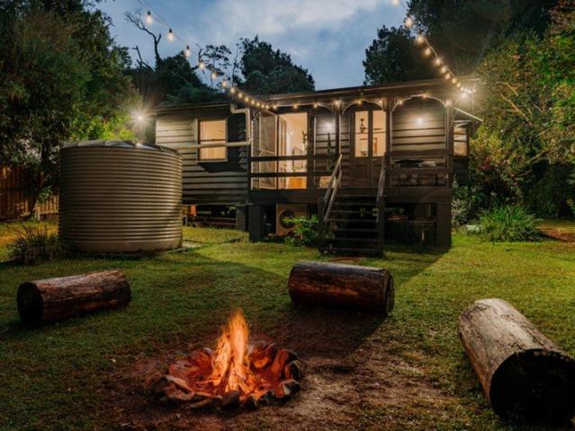 Charming modern cottage with old world charm and creek frontage