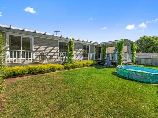 Modern, low maintenance living with strong rental appeal