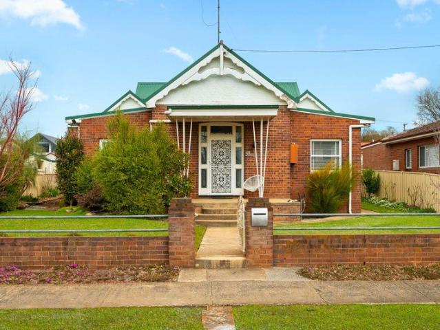 Charming North Facing Double Brick Home with Classic Character