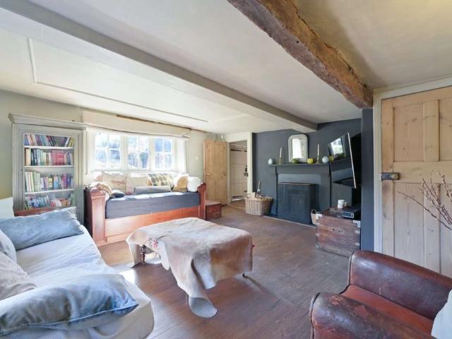 Charming period cottage with generous gardens, character features and versatile family accommodation