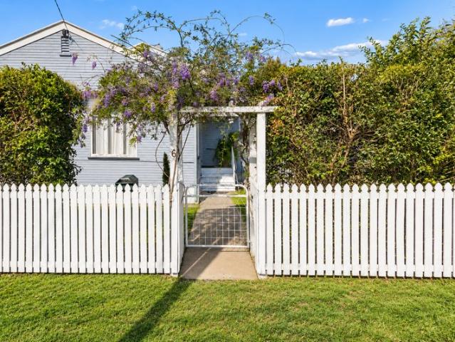 Charming Post War Cottage with Space, Character & Endless Potential